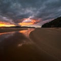 Beautiful bright sunrise over Kiddies Corner on Umina Beach on NSW Central Coast in Australia Royalty Free Stock Photo