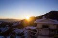 Beautiful bright sunrise over the snow covered mountains sunshine Royalty Free Stock Photo