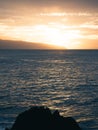 Beautiful bright sunset over the ocean and the North Shore in Oahu Hawaii Royalty Free Stock Photo