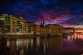 Beautiful bright sunset sky over the water in Florence, Italy