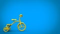 Beautiful bright yellow tricycle - blue background
