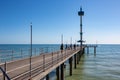 The beautiful Brighton Jetty on a sunny day with blue sky in Sou