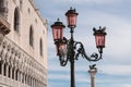 Beautiful bronze ornate lampposts in Piazza San Marco Royalty Free Stock Photo