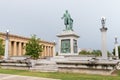 Beautiful bronze statue beside Parthenon in a park