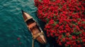 beautiful brown boat on sea with lots of red flowers