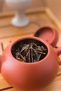 Beautiful brown clay teapot on a bamboo tray Royalty Free Stock Photo