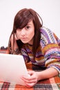 Beautiful brown teen girl with laptop Royalty Free Stock Photo