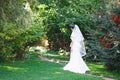 Beautiful brunette bride with bouquet outdoor. Happy bride outdo Royalty Free Stock Photo