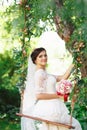 Beautiful brunette bride with bouquet outdoor. Happy bride outdo Royalty Free Stock Photo