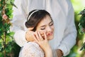 Beautiful brunette bride with bouquet outdoor. Happy bride outdo Royalty Free Stock Photo