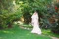 Beautiful brunette bride with bouquet outdoor. Happy bride outdo Royalty Free Stock Photo