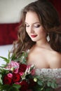 Beautiful brunette Bride wedding Portrait holding roses bouquet Royalty Free Stock Photo