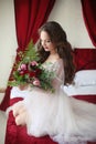 Beautiful brunette Bride wedding Portrait holding roses bouquet Royalty Free Stock Photo