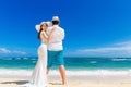 Beautiful brunette bride in white wedding dress and straw hat an Royalty Free Stock Photo