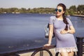 Beautiful brunette caucasian pregnant woman on summer walk outdo Royalty Free Stock Photo