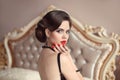 Beautiful brunette, elegant woman portrait. Retro lady with red Royalty Free Stock Photo