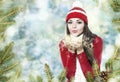 Beautiful brunette girl blowing star dust - christmas portrait