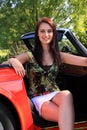 Beautiful brunette girl classic car