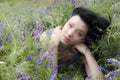 Beautiful Brunette Girl in flowers