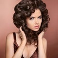 Beautiful Brunette Girl. Healthy Curly Hair. Makeup. Attractive Royalty Free Stock Photo