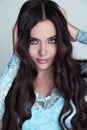 Beautiful Brunette Girl. Healthy Long Curly Hair. Royalty Free Stock Photo