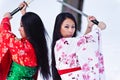 Beautiful brunette girls in a japanese kimono