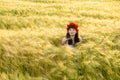Beautiful brunette lady in wheat field. Royalty Free Stock Photo