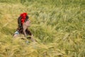 Beautiful brunette lady in wheat field. Royalty Free Stock Photo
