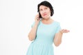 Beautiful brunette middle-aged woman talking on mobile phone Royalty Free Stock Photo