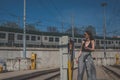 Beautiful brunette posing in an industrial context