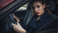 Beautiful brunette sexy spy agent killer or police woman in leather jacket and jeans with a gun in her hand driving a car after Royalty Free Stock Photo