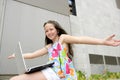 Beautiful brunette teen expression with laptop Royalty Free Stock Photo