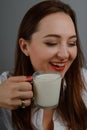 Beautiful woman with glass of milk smiling Royalty Free Stock Photo