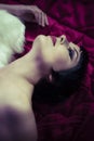 Beautiful brunette woman lying naked Royalty Free Stock Photo