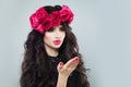 Beautiful Brunette Woman Model Blowing a Kiss. St. Valen Royalty Free Stock Photo