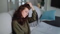 Beautiful brunette woman portrait touching hair