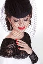 Beautiful Brunette Woman. Retro Fashion portrait in elegant hat Royalty Free Stock Photo