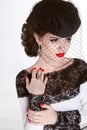 Beautiful Brunette Woman. Retro Fashion portrait in elegant hat Royalty Free Stock Photo