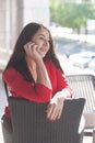 Beautiful brunette young woman dressed in red classic tweed jacket Royalty Free Stock Photo