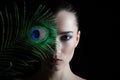 Beautiful brunette young woman with peacock style Royalty Free Stock Photo