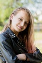 Beautiful brutal teen girl with leather jacket