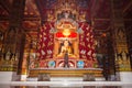 beautiful Buddha sculpture inside the high yellow pagoda in wat Bang Tong