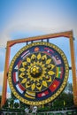 Beautiful Buddhist giant gong with southeast asian flags painted