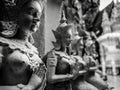 Beautiful buddhist sculpture hands clasped in prayer, detail of buddhist figures carved in Wat Sanpayangluang at Lamphun, Thailand Royalty Free Stock Photo