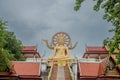 Beautiful buddhist temple with buddha statue on the top. Thailand. Cloudy day Royalty Free Stock Photo