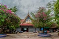 Beautiful buddhist temple with park. Thailand. Cloudy day Royalty Free Stock Photo