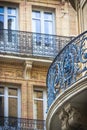 Beautiful building details. Ornate facade with iron balconies. Toulouse, France