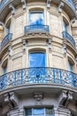 Beautiful building details. Ornate facade with iron balconies. Toulouse, France
