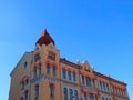 Beautiful building in modern style against the blue sky. Royalty Free Stock Photo