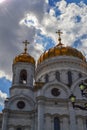 Beautiful building of the Russian Orthodox Church. Covered in gold dome. Crosses and exterior decoration. Love to God Royalty Free Stock Photo